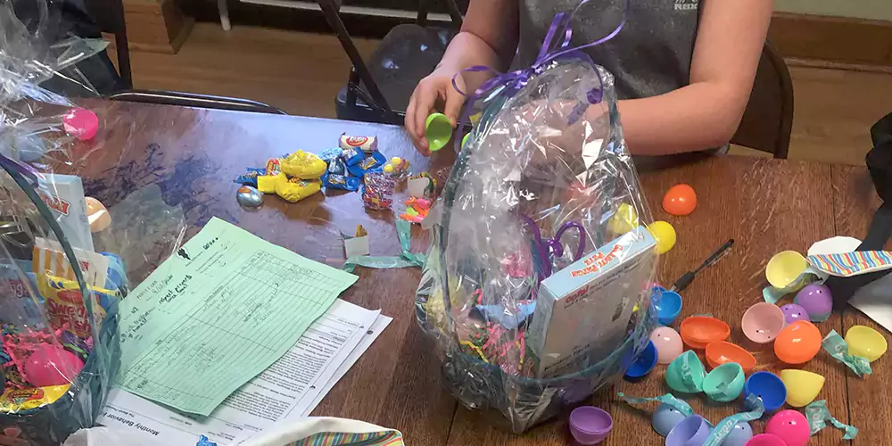 Youth enjoy their Easter goodies provided by the Shirley Haight family. 